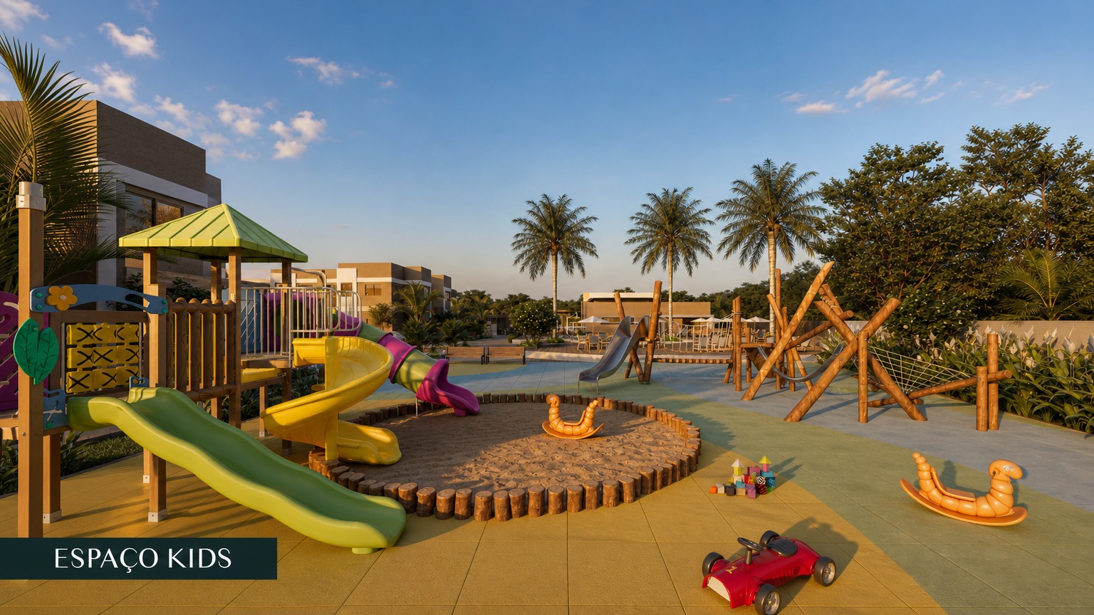 Espaço kids do condomínio com playground colorido, tanque de areia e coqueiros